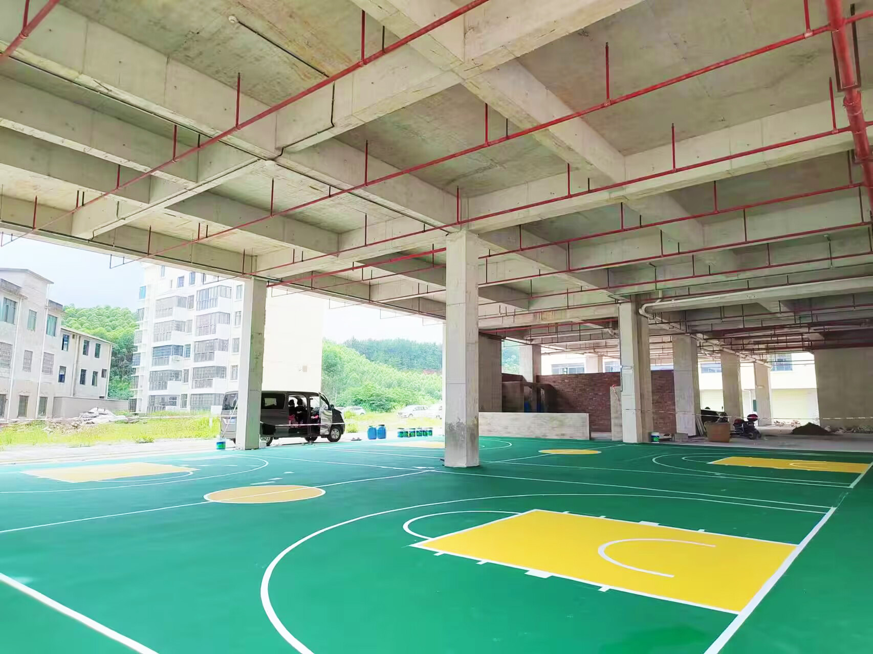 Resilient acrylic basketball court