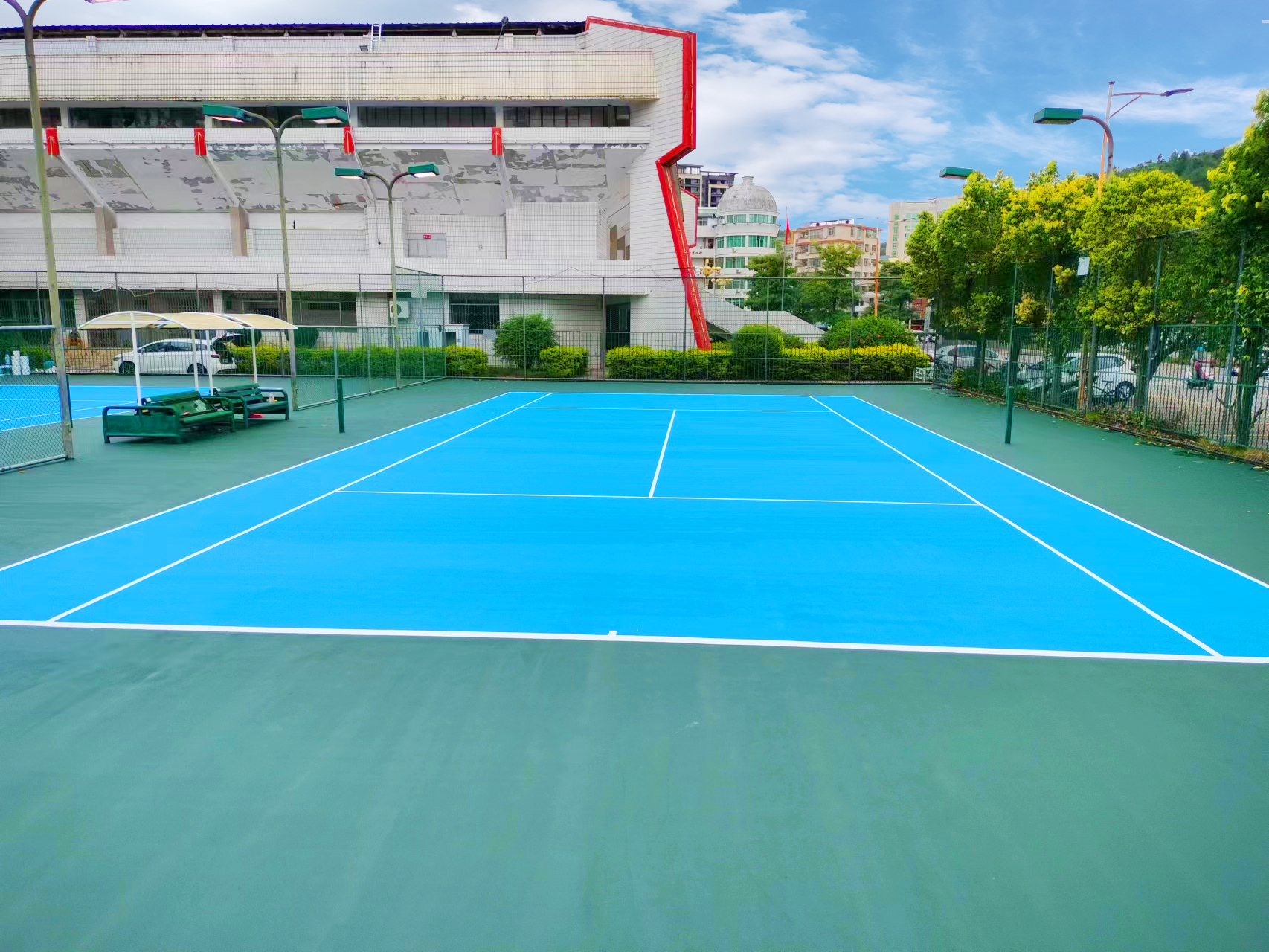 Resilient acrylic basketball court