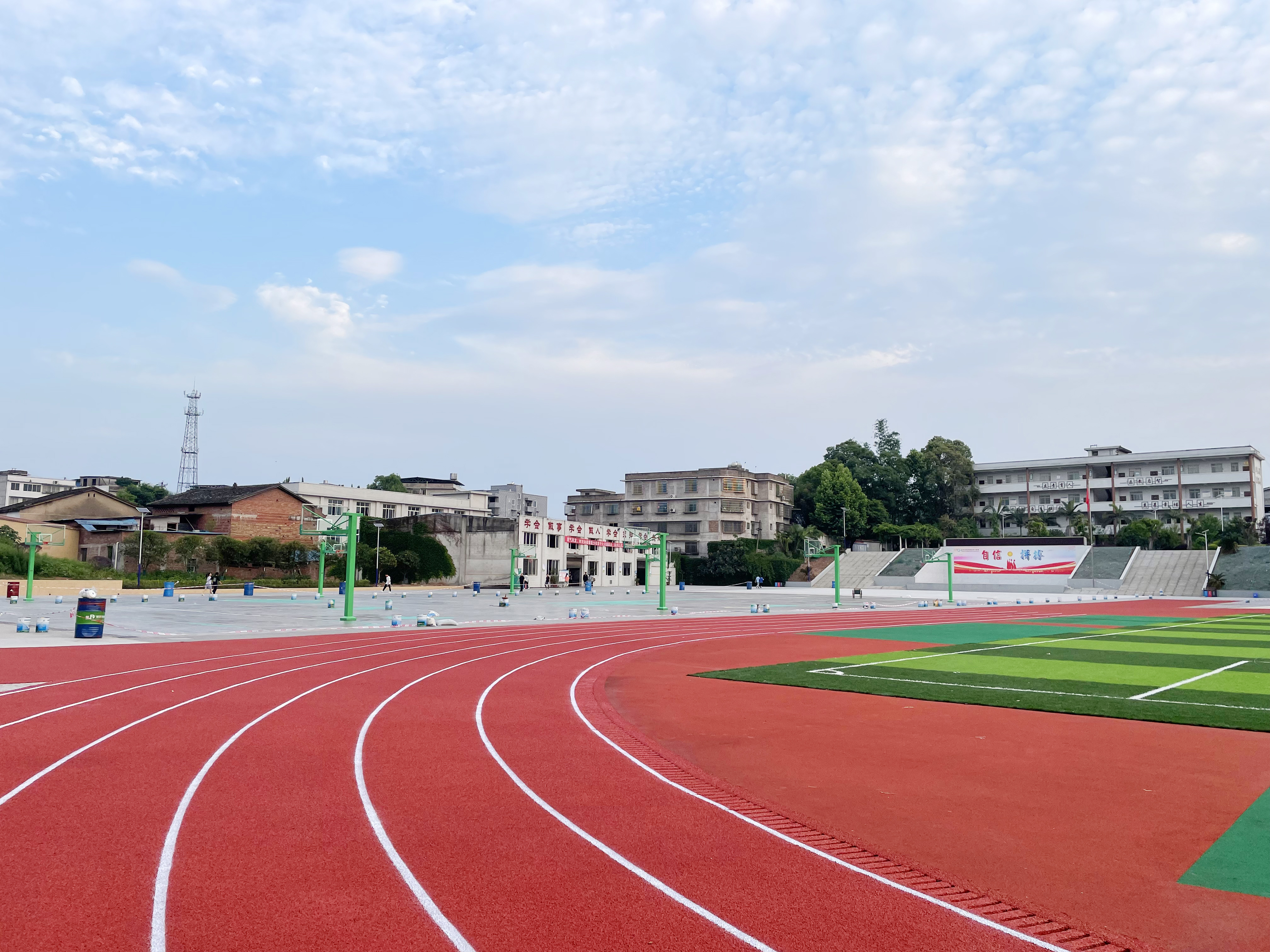 Air permeable running track surface for school sports field